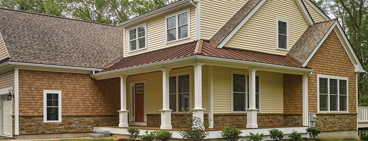 House with cedar impressions siding